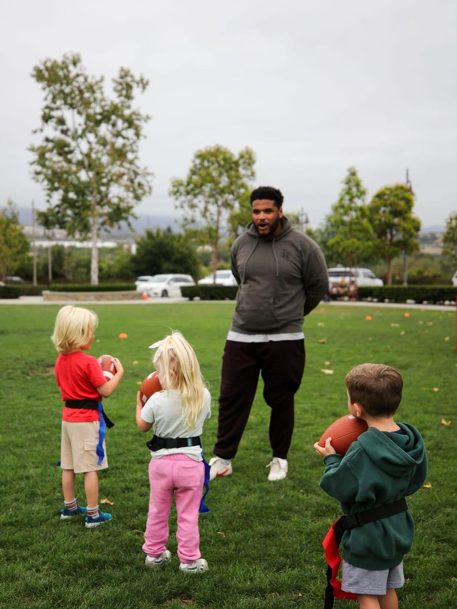 AFC coach Mike leading a multi-sport class with young athletes in Orange County