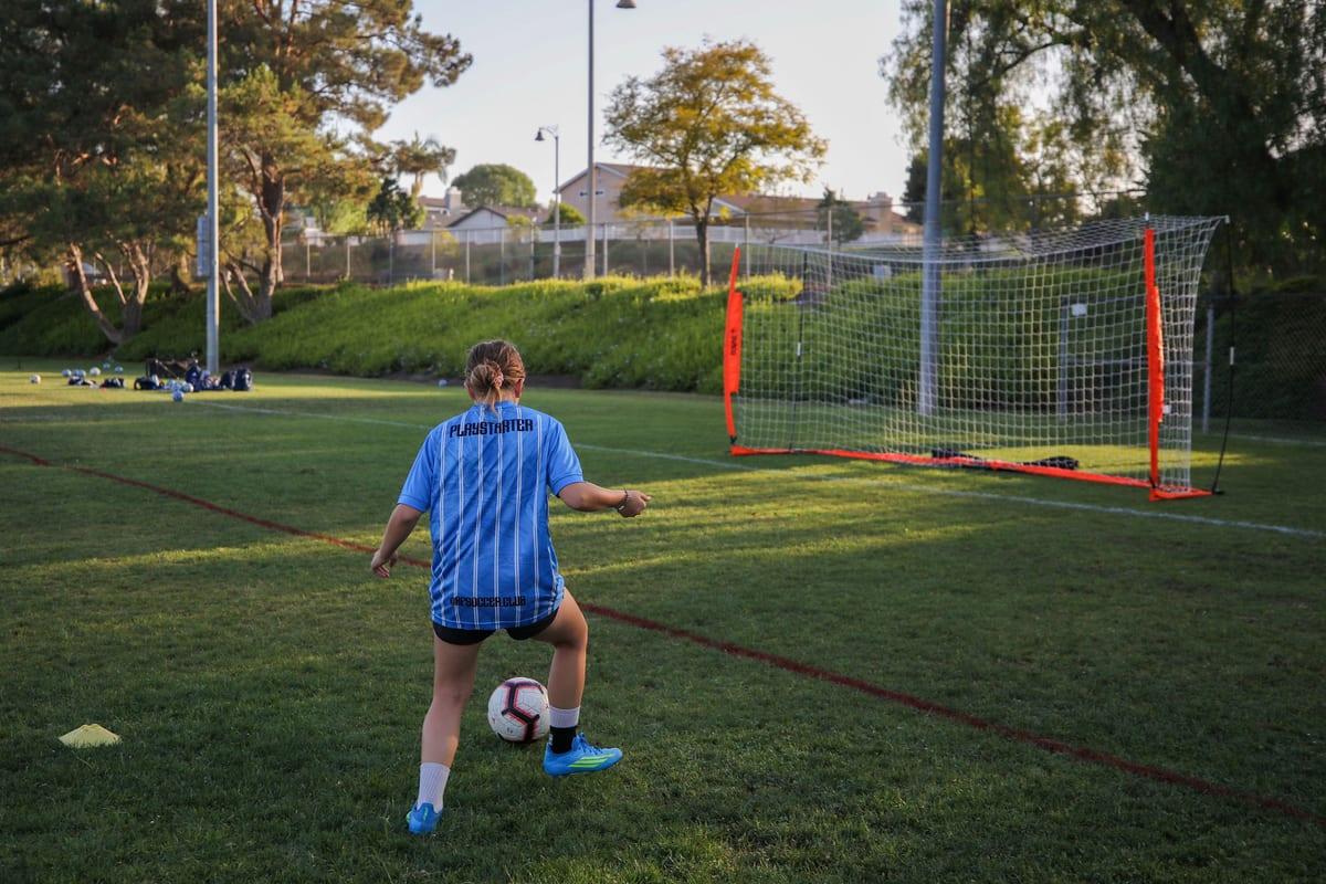 A young athlete working through a technical drill at AFC Performance training